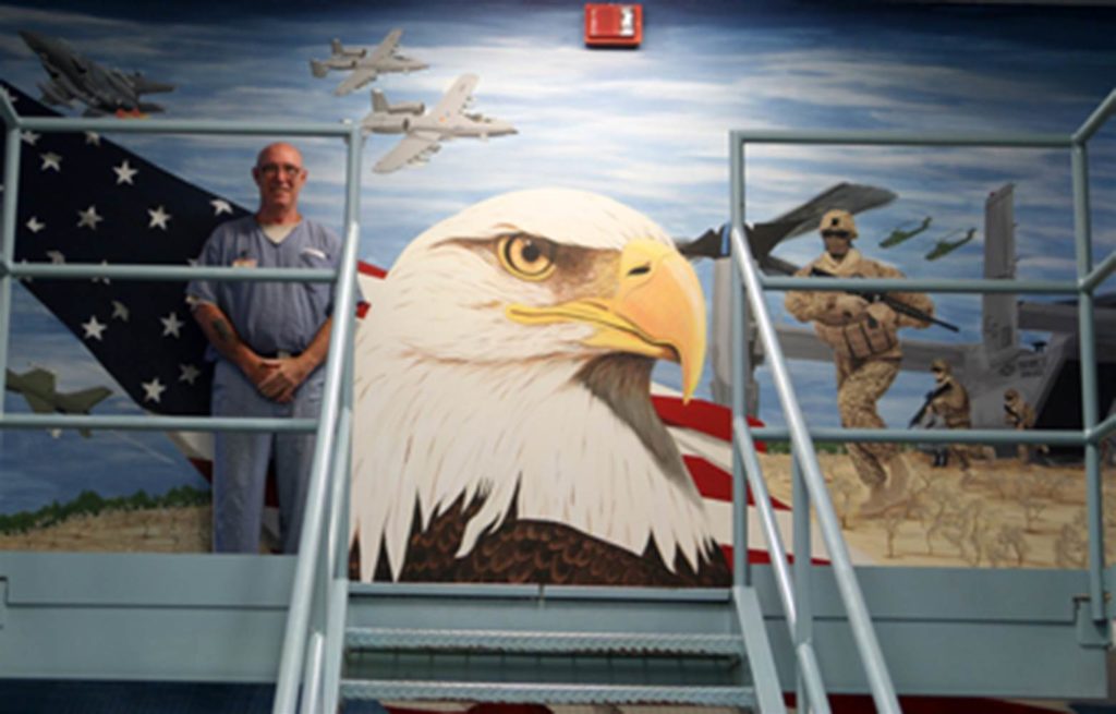 Inmates in Florida's veteran dorms paint murals representing the service branches on prison wards.